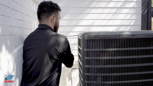 employee with AC unit